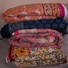 Quilts, quilted fabrics, bedspreads